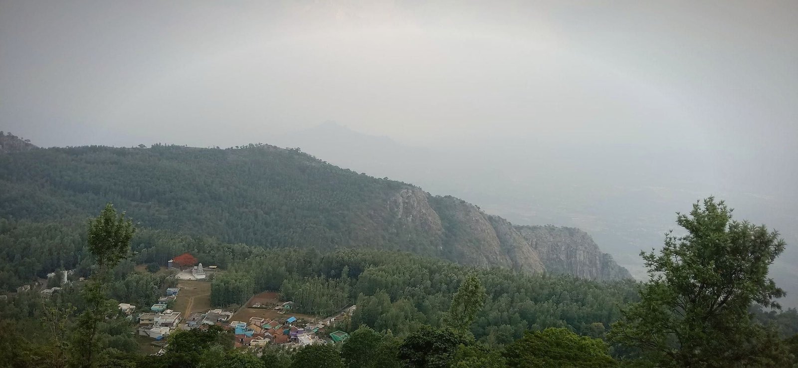 Misty green hills seen from a Yercaud viewpoint
